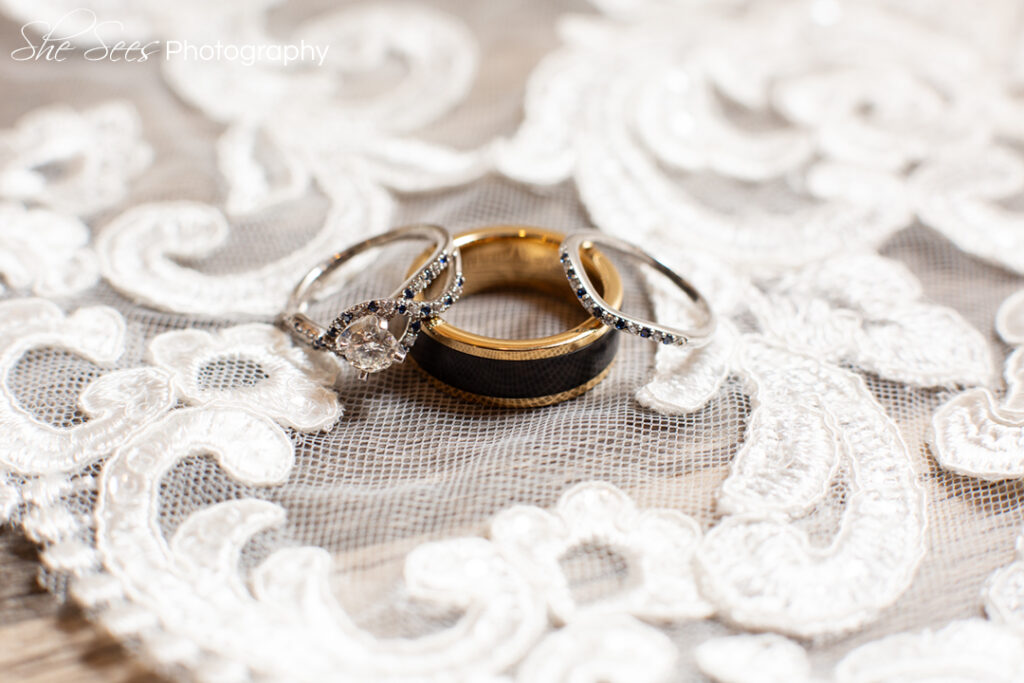 Wedding rings on wedding dress